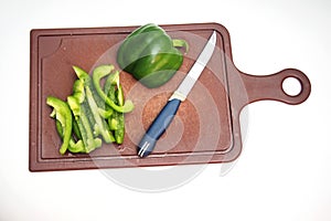 Green pepper fruit lies on the cutting Board