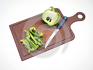 Green pepper fruit lies on the cutting Board