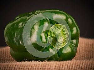 Green pepper with a rustic background