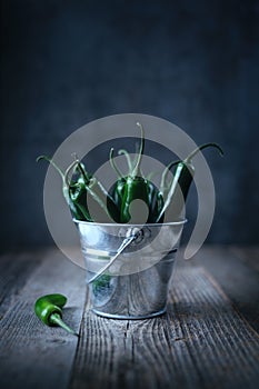Green pepper on a wooden table