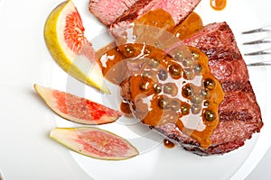 Green peppercorn beef filet mignon photo