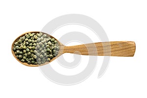 Green peppercorn seeds in wooden spoon isolated on white background. spice for cooking food, top view