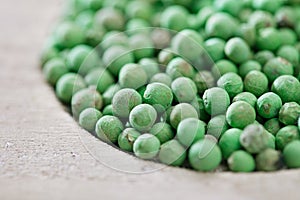 Green peppercorn in wooden bowl