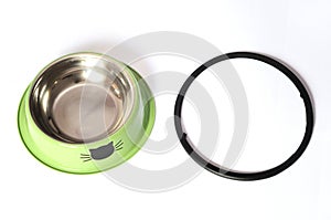 A green pet bowl with stopper removed and placed side by side white backdrop photo