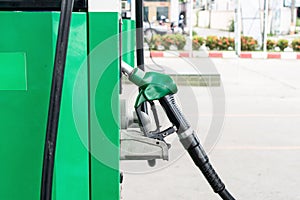 Green petrol pump in gas station. Gas station in a service.