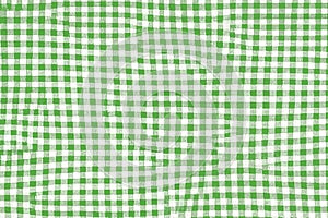 Green picnic blanket fabric with squared patterns and texture