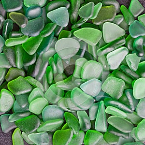 Green pieces of glass polished by the sea