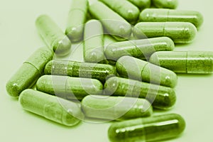 Green pills capsules