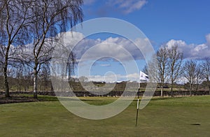 The Green and Pin Marker at Hole 1 of the Glens Course at Letham Grange Golf Club in Colliston.
