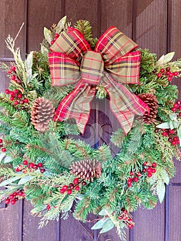 Green Pine Wreathe with Pinecones and Plaid Bow