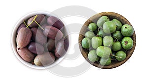 Green and pink actinidia isolated on white background. Actinidia with copy space for text. Kiwi fruit actinidia. Baby kiwi fruits