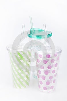 Green & pink plastic tumblers photo