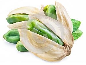 Green pistachio nuts with pistachio shell on white background.