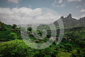 Green plains and mountains with view over the city of Assomada on the island of Santiago, Cabo Verde islands photo