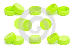 Green plastic bottle cap on white background