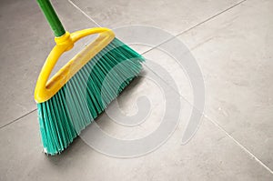 Green plastic broom photo