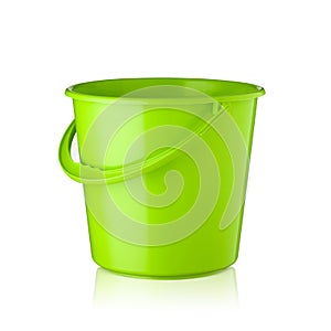 Green plastic bucket for household needs isolated on white background. Household products.