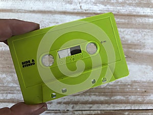 Green plastic cassette tape, dated 1991