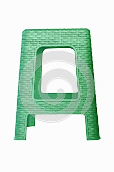 Green plastic chair isolated on white bsckground