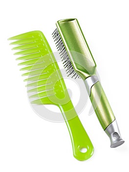 Green plastic comb and hairbrush