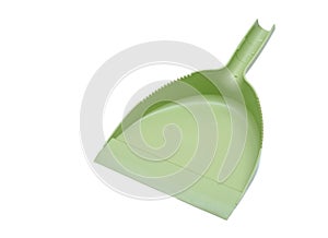 Green plastic dustpan isolated
