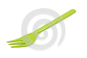 Green plastic forks isolated on white background