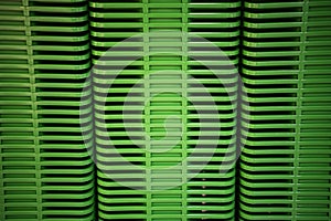 Green plastic home containers tower at store