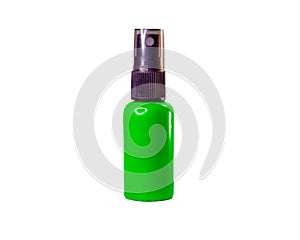 Green plastic packaging bottle, spray head type, with lid, white background, isolated