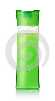 Green plastic shampoo bottle