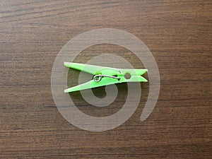 Green plastic spring Clothespin