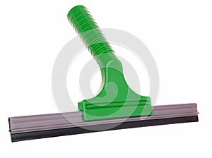 A green plastic squeegee window cleaning utensil