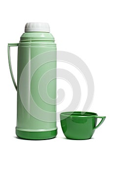 Green plastic thermos flask photo