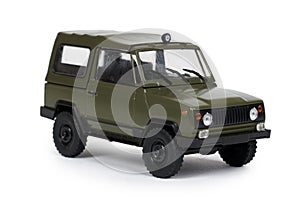 Green plastic toy SUV vehicle, offroad truck, military car, 4x4 auto. Isolated on white background