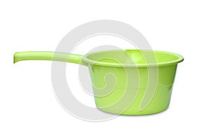 Green plastic water scoop isolated on white background