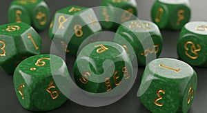 Green polyhedral dice with gold numbers, commonly used in tabletop role-playing photo