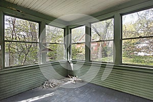 Green porch in old abandoned home