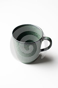 Green pottery and crafted coffee cup
