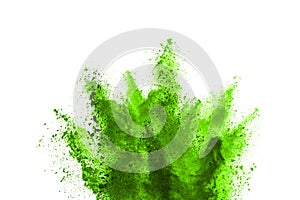 Green powder explosion on white background.