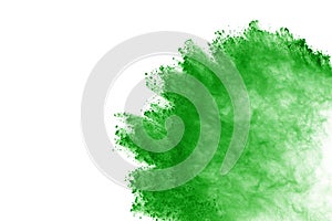 Green powder explosion on white background. Colored cloud. Color dust explode. Paint Holi.