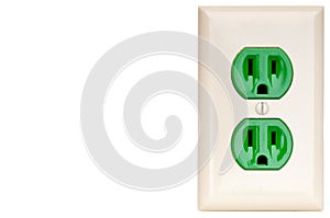A green power outlet receptacle