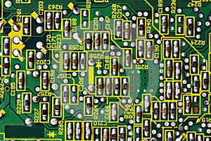 Green printed circuit board PCB with chip texture or background. Electronic embedded system design