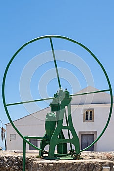 Green pump in Cecela Velha, Portugal