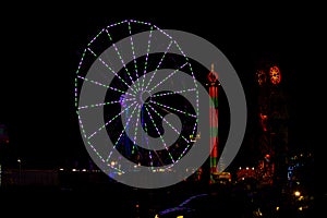 Green and Purple July 4th Ferris Wheel in Carnival at Night