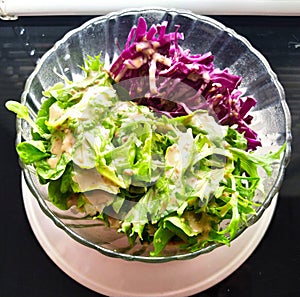 Green and purple lettuce Salad in the bowl