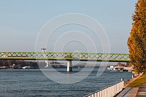 Green railroad bridge over Danube river in Bratislava