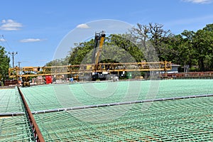 Green rebar in layers on a bridge building project