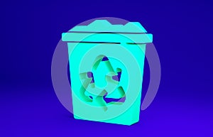 Green Recycle bin with recycle symbol icon isolated on blue background. Trash can icon. Garbage bin sign. Recycle basket