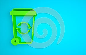Green Recycle bin with recycle symbol icon isolated on blue background. Trash can icon. Garbage bin sign. Recycle basket