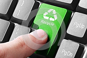 Green recycle button on the keyboard