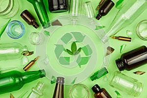 Green recycle sign symbol with glass trash garbage